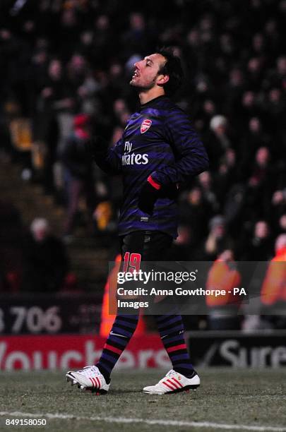 Arsenal's Santi Cazorla reacts after his penalty is saved by Bradford City goalkeeper Matt Duke