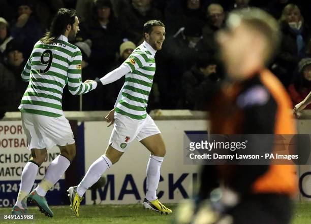 Celtic's Adam Matthews celebrates his goal with team mate Georgios Samaras during the Scottish Cup Fourth Round Replay match at Gayfield Park,...