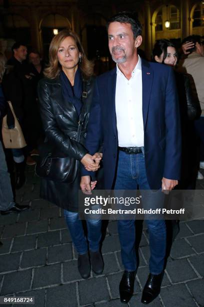 Violonist Anne Gravoin and her husband politician Manuel Valls attend "La vraie vie" Theater Play at Theatre Edouard VII on September 18, 2017 in...