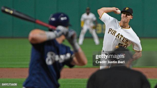Jameson Taillon of the Pittsburgh Pirates delivers a pitch to Hernan Perez of the Milwaukee Brewers in the second inning during the game at PNC Park...