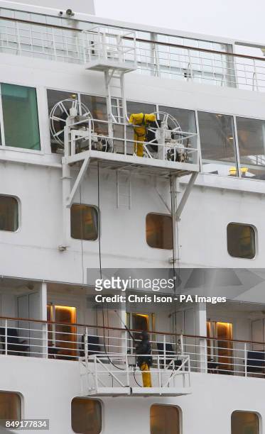 Crew members jet wash the outside of the P&O liner Oriana after it docked in Southampton after returning from a 10-night Baltic cruise out of...