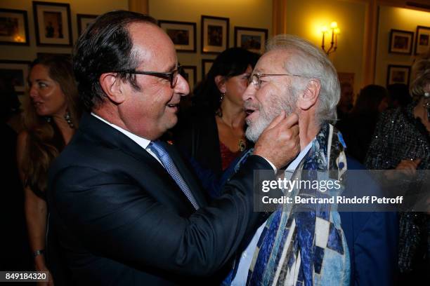 Former French President, Francois Hollande and actor of the piece Bernard Murat attend "La vraie vie" Theater Play at Theatre Edouard VII on...