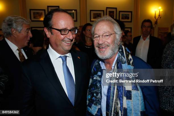 Former French President, Francois Hollande and actor of the piece Bernard Murat attend "La vraie vie" Theater Play at Theatre Edouard VII on...