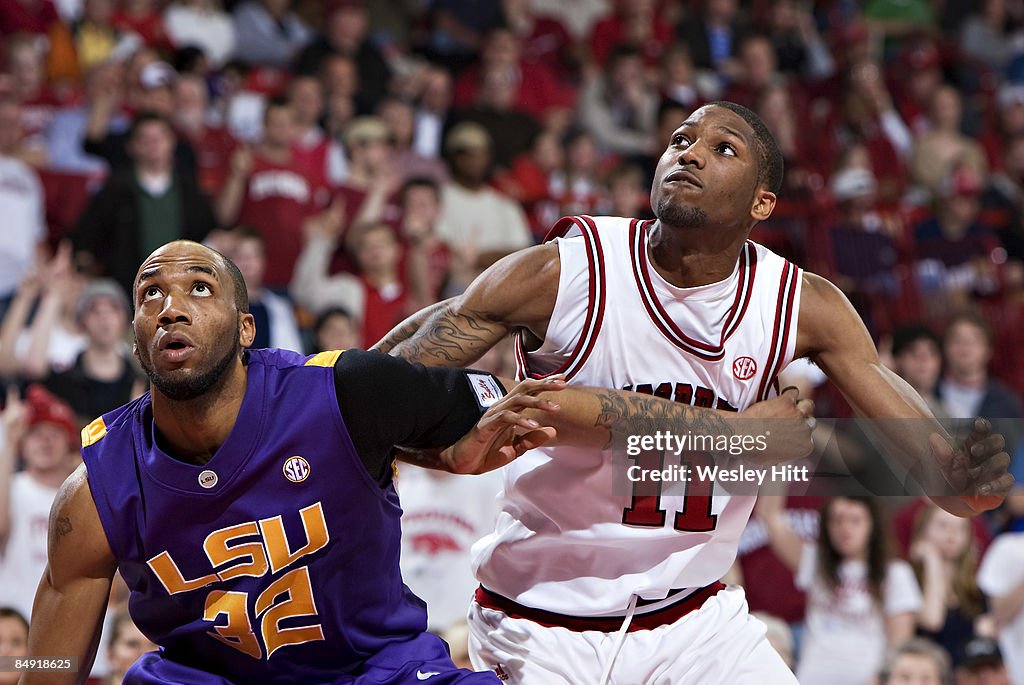 Fighting Razorback Brandon Moore of the Arkansas Razorbacks tries to fight through a ...