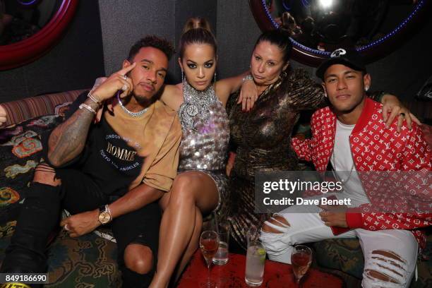 Lewis Hamilton, Rita Ora, Guest and Neymar attends the Miu Miu LOVE party at Loulou's on September 18, 2017 in London, England.