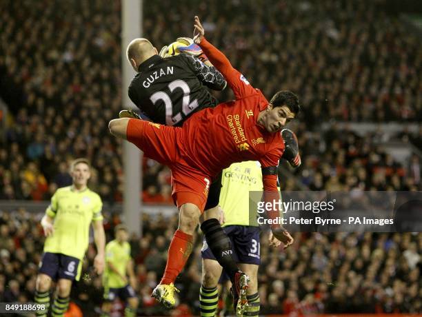 Aston Villa's Bradley Guzan makes a save from Liverpool's Luis Suarez