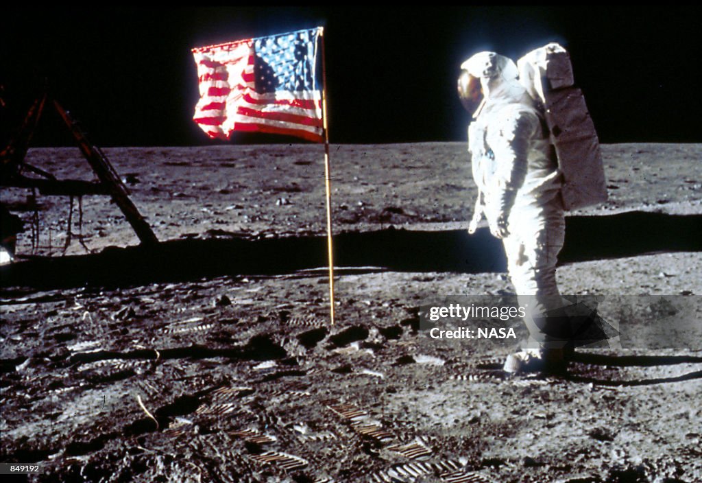 Buzz Aldrin Poses next To The U.S. flag On Moon