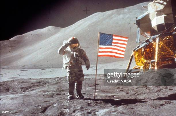 Astronaut David Scott gives salute beside the U.S. Flag July 30, 1971 on the moon during the Apollo 15 mission.