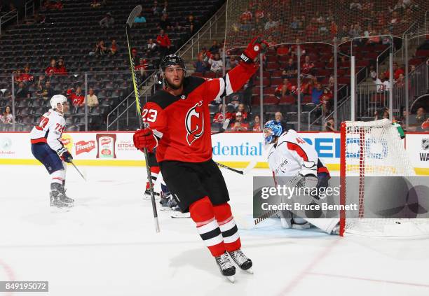 Stefan Noesen of the New Jersey Devils celebrates his goal at 1:40 of the second period against Vitek Vanecek of the Washington Capitals during a...