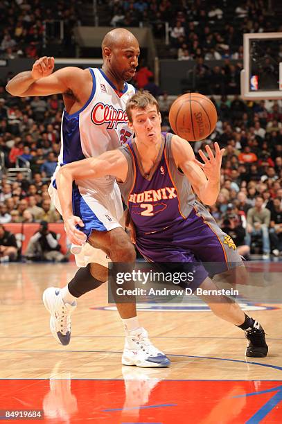 Goran Dragic of the Phoenix Suns handles the ball against Mardy Collins of the Los Angeles Clippers at Staples Center on February 18, 2009 in Los...