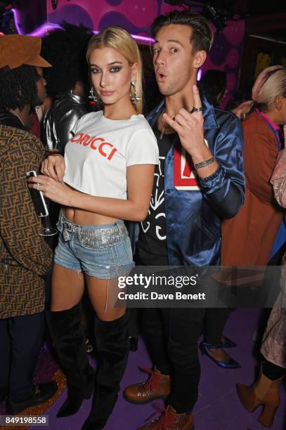 Hailey Baldwin and Cameron Dallas attend the LOVE magazine x Miu Miu party, held during London Fashion Week, at Loulou's on September 18, 2017 in...