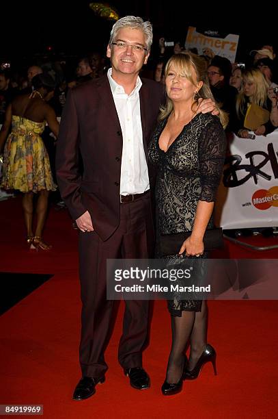Philip Schofield and his wife Stephanie Lowe arrives at the BRIT Awards 2009 at Earls Court on February 18th 2009 in London, England.