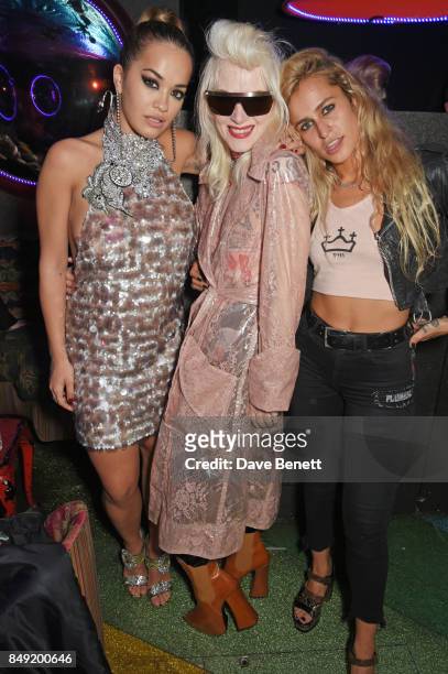 Rita Ora, Pam Hogg and Alice Dellal attend the LOVE magazine x Miu Miu party, held during London Fashion Week, at Loulou's on September 18, 2017 in...