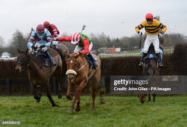 Fentara and Daryl Jacob fall as eventual winner Harris Hawk and John Dawson jump the final fence in the Buy Your 2013 Annual Badge Today Handicap...