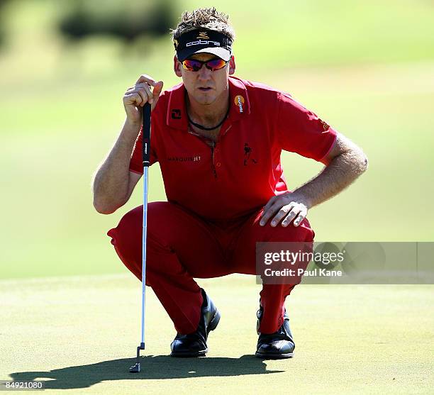 Ian Poulter of England lines up his putt on the 13th hole during day one of the 2009 Johnnie Walker classic held at The Vines Resort and Country Club...