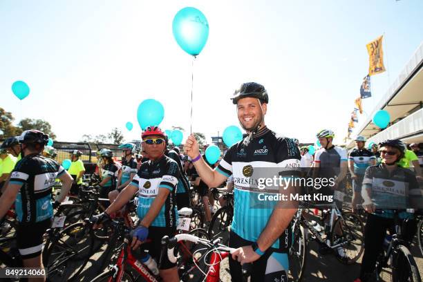 Pedalthon founder Simon Clarke holds a balloon at the start line during the 2017 Below The Belt Pedalthon at Sydney Motorsport Park on September 19,...