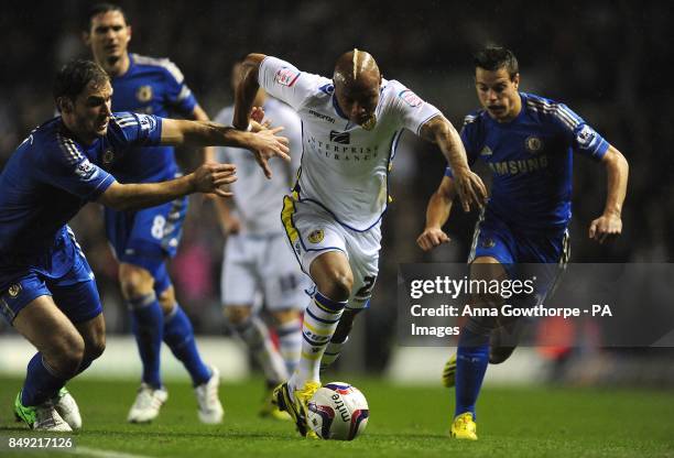 Leeds United's El-Hadji Diouf battles for the ball with Chelsea's Cesar Azpilicueta and Branislav Ivanovic
