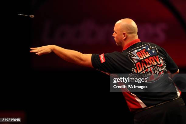 Darin Young in action during the Ladbrokes.com World Darts Championship at Alexandra Palace, London.