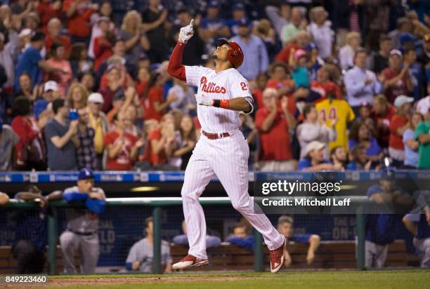 Aaron Altherr of the Philadelphia Phillies reacts after hitting a grand slam in the bottom of the sixth inning against the Los Angeles Dodgers at...