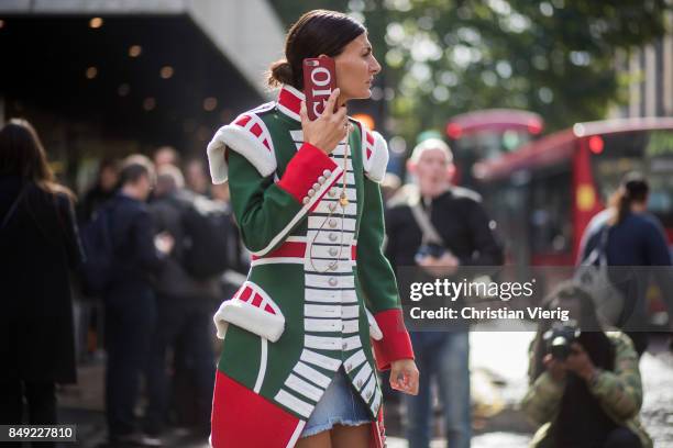 Giovanna Engelbert wearing circus jacket outside Erdem during London Fashion Week September 2017 on September 18, 2017 in London, England.