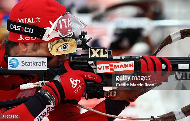 Ole Einar Bjoerndalen of Norway shoots during the mixed relay of the IBU Biathlon World Championships on February 19, 2009 in Pyeongchang, South...