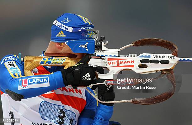 Carl Johan Bergman of Sweden shoots during the mixed relay of the IBU Biathlon World Championships on February 19, 2009 in Pyeongchang, South Korea.