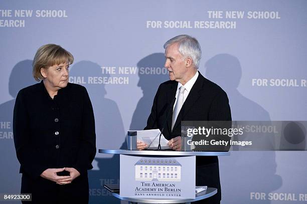 German Chancellor Angela Merkel and President of the New School For Social Research, Bob Kerrey talk during the presentation of honorary degree of...