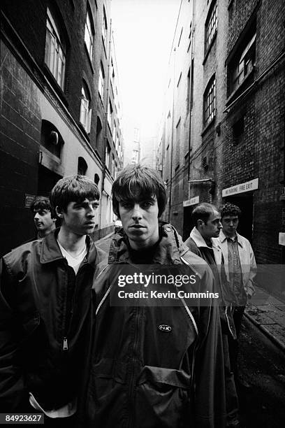 Manchester rock band Oasis, London, 17th March 1994. Left to right: bassist Paul McGuigan, guitarist Noel Gallagher, singer Liam Gallagher, rhythm...