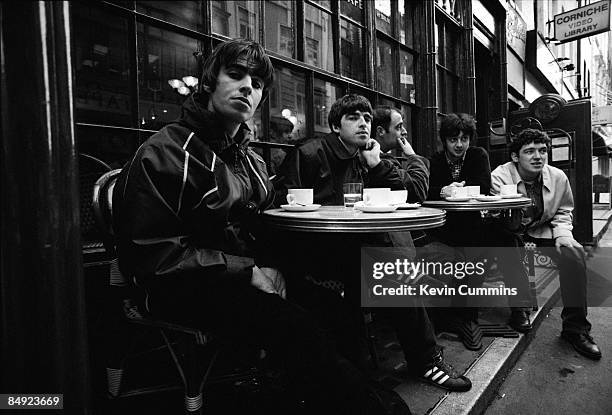 Manchester rock band Oasis outside a cafe in Frith Street, London, 17th March 1994. Left to right: singer Liam Gallagher, guitarist Noel Gallagher,...