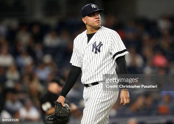 Dellin Betances of the New York Yankees looks on after being taken out of the game in the top of the eighth inning against the Minnesota Twins on...