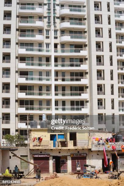 New City of Gurgaon in India. Gurgaon is a satellite city of New Delhi which has grown quickly over the past 30 years. The economic boom has created...