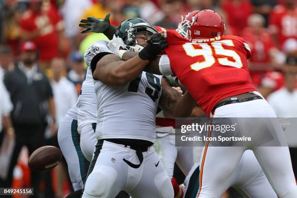 Kansas City Chiefs defensive end Chris Jones gets pressure on Philadelphia Eagles offensive guard Brandon Brooks and causes a fumble by quarterback...