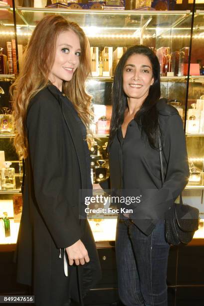 Tv presenter Cyrielle Joelle and actress Fatima Adoum attend 'Nuit Jovoy Rose Millesimee' at Jovoy Store on September 18, 2017 in Paris, France.