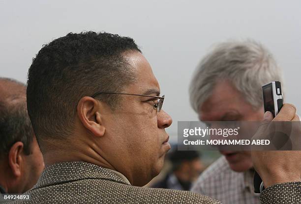 Democratic Congressmen Keith Ellison takes pictures of houses that were destroyed during Israel's 22-day offensive during a visit to the Jabalia...