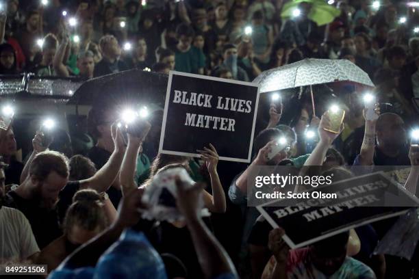 Demonstrators protest outside of the St. Louis city jail following the arrest of 123 people yesterday protesting the acquittal of former St. Louis...