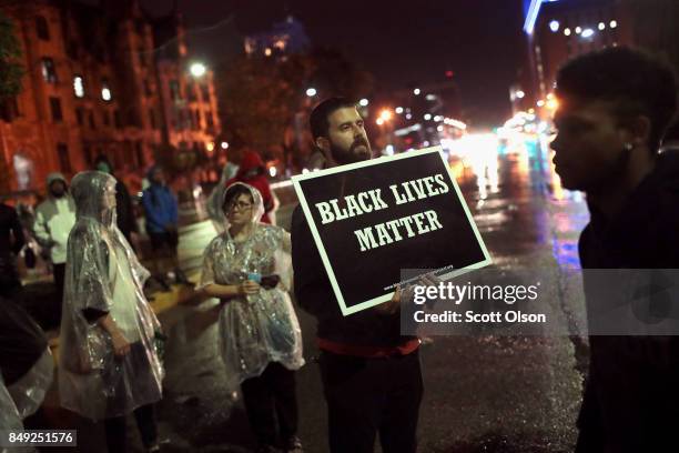 Demonstrators protest outside of the St. Louis city jail following the arrest of 123 people yesterday protesting the acquittal of former St. Louis...