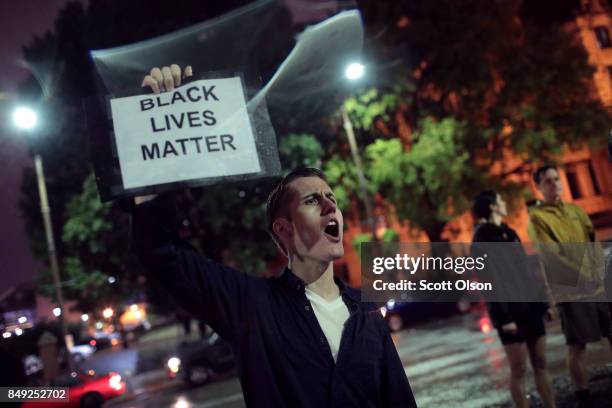 Demonstrators protest outside of the St. Louis city jail following the arrest of 123 people yesterday protesting the acquittal of former St. Louis...