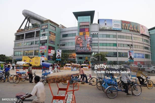 Mall center in Gurgaon. Gurgaon is the industrial and financial center of Haryana. Over the past 25 years the city has undergone rapid development...