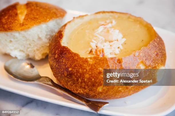 clam chowder served in bread, san francisco, california, usa - clam chowder stock pictures, royalty-free photos & images