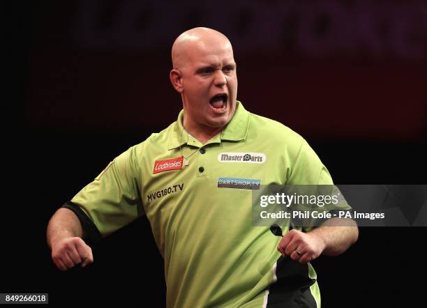 Michael van Gerwen celebrates against Colin Lloyd during the Third Round of the Ladbrokes.com World Darts Championship at Alexandra Palace, London.