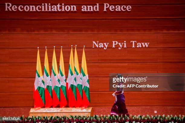 Myanmar's State Counsellor Aung San Suu Kyi arrives to deliver a national address in Naypyidaw on September 19, 2017. Myanmar leader Aung San Suu Kyi...