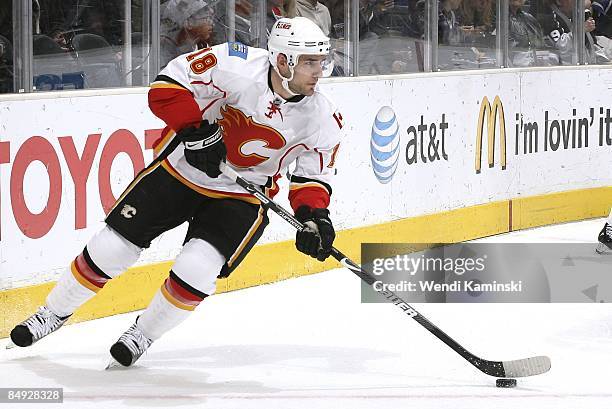 Matthew Lombardi the Calgary Flames drives the puck behind the net against the Los Angeles Kings on February 12, 2009 at Staples Center in Los...