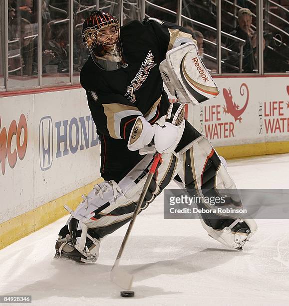 Jonas Hiller of the Anaheim Ducks moves the puck from behind the net during the game against the Atlanta Thrashers on February 15, 2009 at Honda...