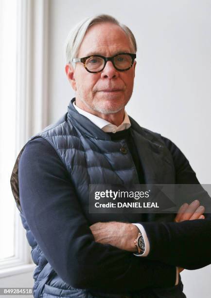 Designer, Tommy Hilfiger poses for a portrait at the Tommy Hilfiger showroom in Knightsbridge, west London on September 18, 2017. - Designer Tommy...