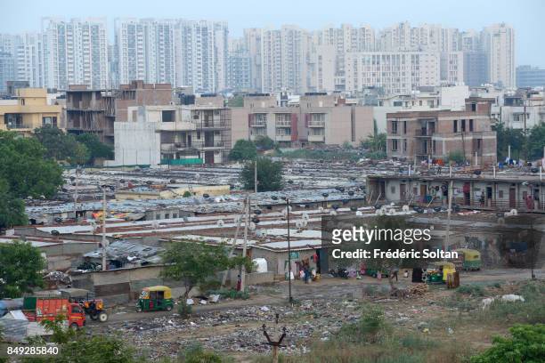 New City of Gurgaon in India. Gurgaon is a satellite city of New Delhi which has grown quickly over the past 30 years. The economic boom has created...