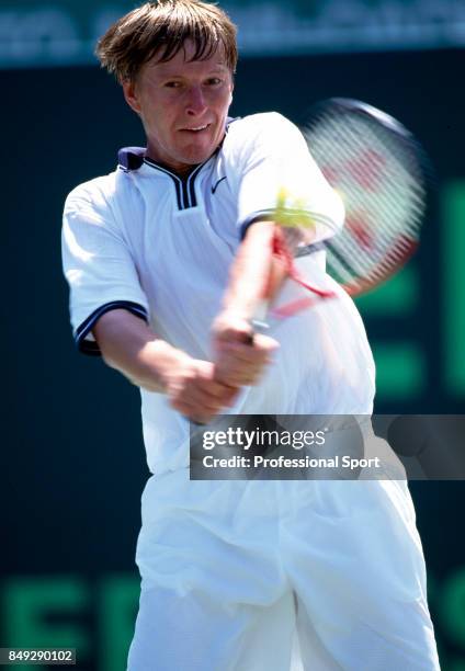 Yevgeny Kafelnikov of Russia in action during a men's singles match at the Ericsson Open Tennis Championships in Key Biscayne, Florida, circa April...