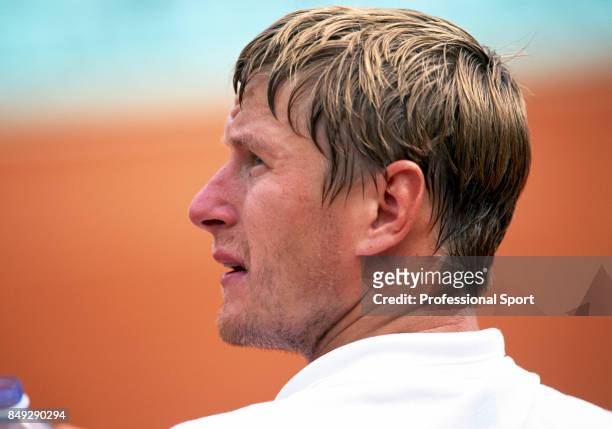 Yevgeny Kafelnikov of Russia in action during a men's singles match at the French Open Tennis Championships at the Roland Garros Stadium in Paris,...