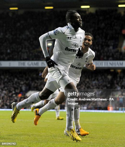 Tottenham Hotspur's Emmanuel Adebayor celebrates with team-mate Kyle Naughton after scoring his side's second goal of the game