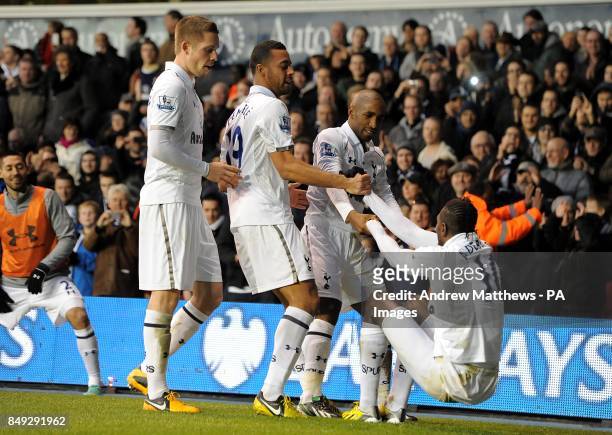 Tottenham Hotspur's Emmanuel Adebayor celebrates with his team-mates after scoring his side's second goal of the game