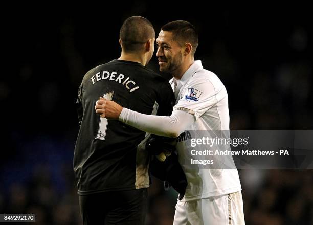 Reading goalkeeper Adam Federici shakes hands with Tottenham Hotspur's Clint Dempsey after the final whistle